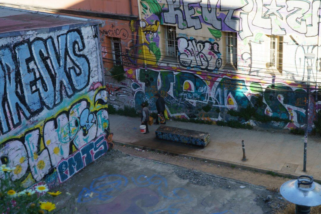 Colorful mural and stairway in a Valparaíso hillside neighborhood